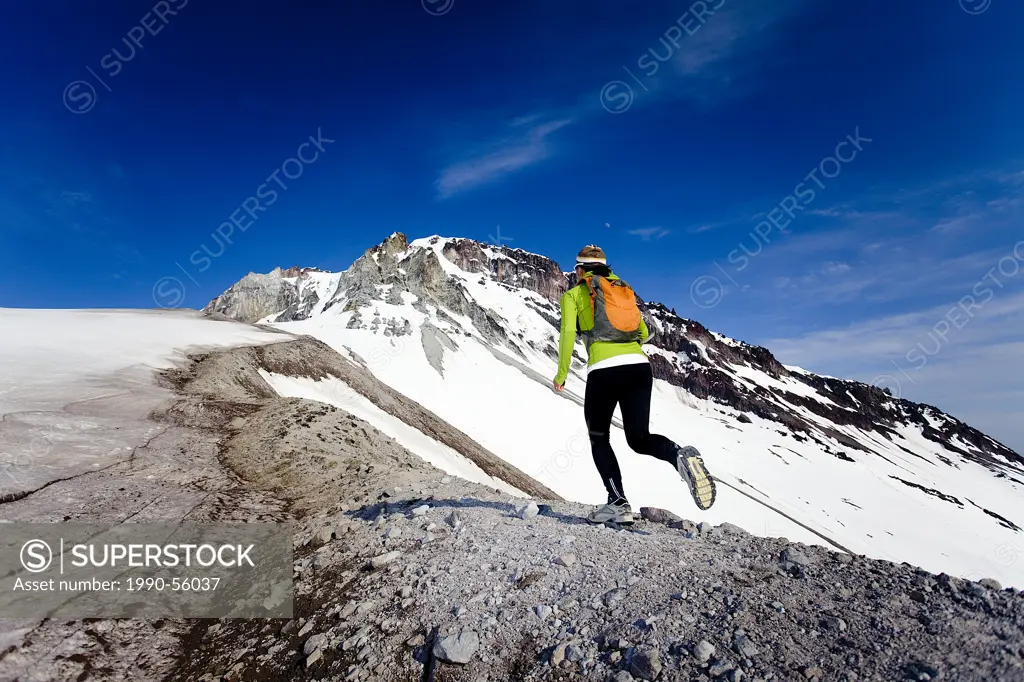 Female runner on Garibaldi Mt. between Whistler and Squamis, BC, Canada