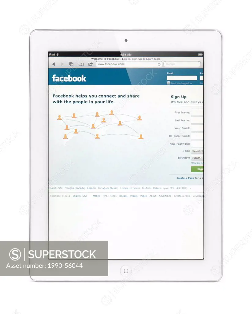 White Apple iPad 2 tablet computer with Facebook home page on its display