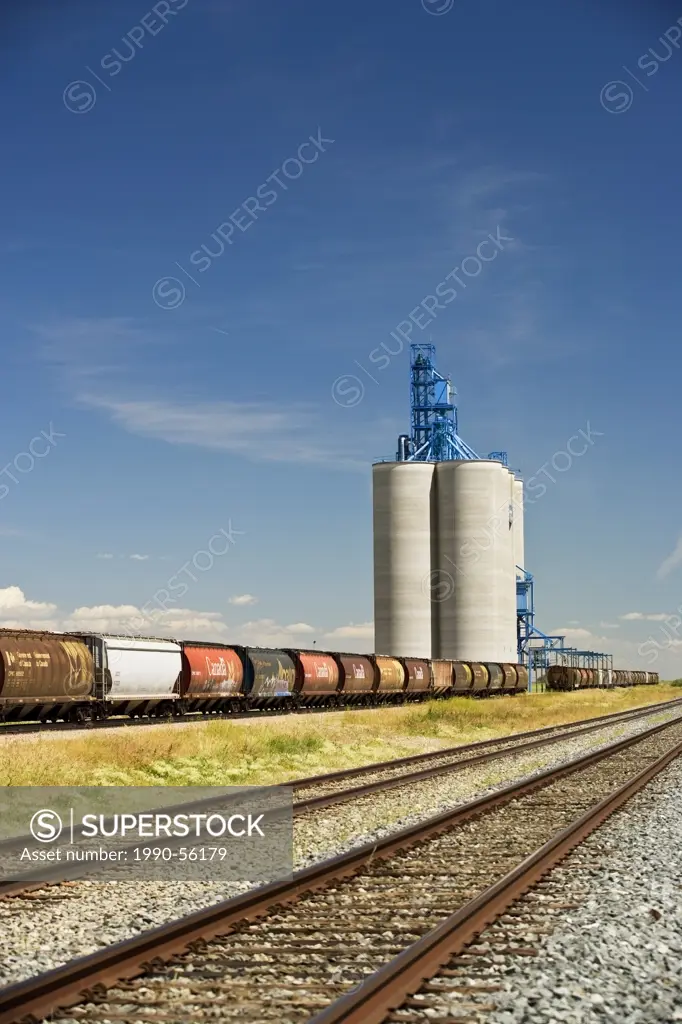 Grain elevator and railroad near Transcanada Highway, Alberta, Canada.
