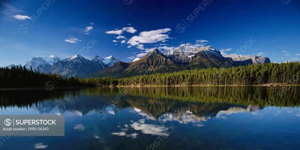 The Bow Range reflected in Herbert Lake, Banff National Park, Alberta, Canada.