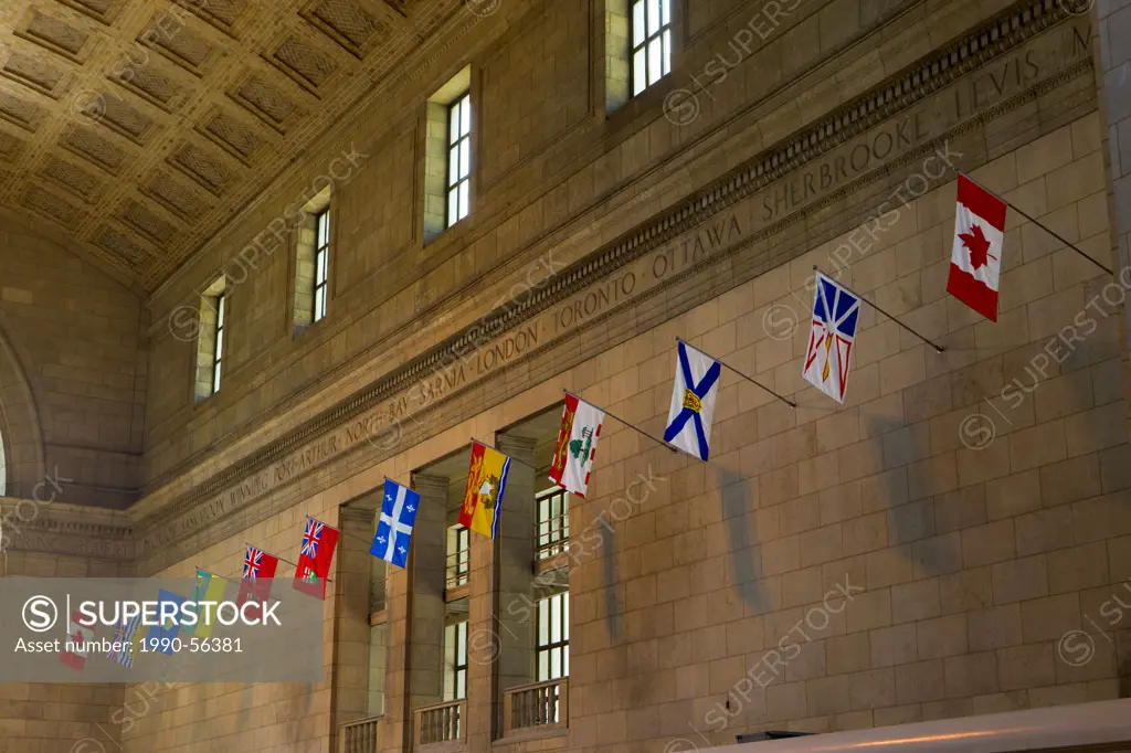 Provincial flags lining the walls of the lobby Great Hall of Union Station in downtown Toronto, Ontario, Canada