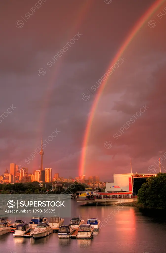 Boats in marina after storm with rainbow, Toronto, Ontario, Canada