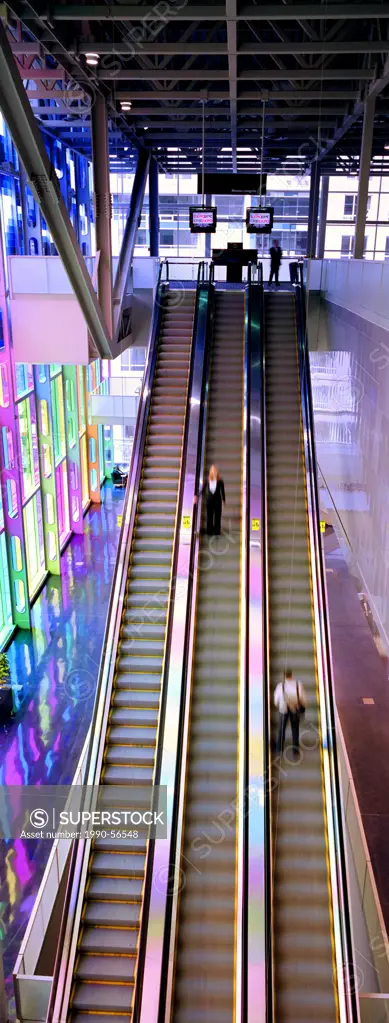 escalators and coloured windows in the Montreal Convention Center, Montreal, Quebec, Canada.