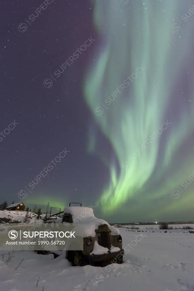 The aurora borealis, or northern lights, above an abandoned truck in Yellowknife, Northewst Territories, Canada.