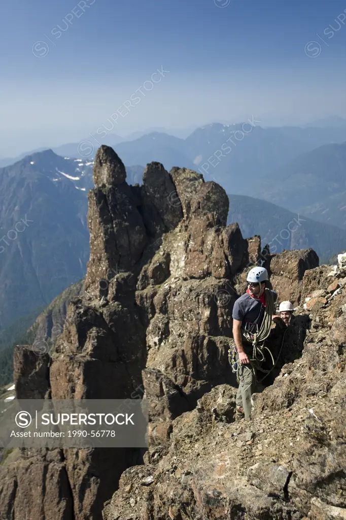 Two climbers ascending the NorthWest ridge of Elkhorn Mountain, Strathcona Park, Central Vancouver Island