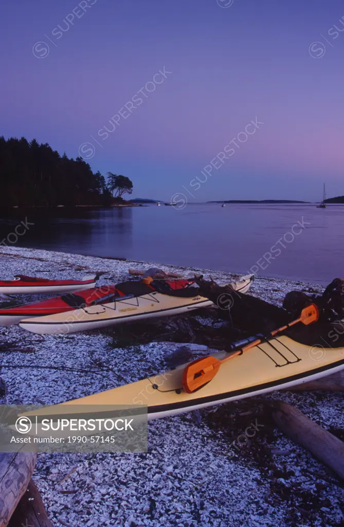 kayakers camping at shell beach, Portland Island, Gulf Islands National Park Reserve, British Columbia, Canada.