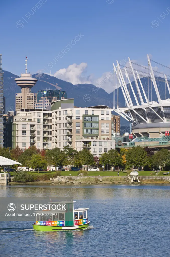 Aquabus Ferry, city skyline with new retractable roof on BC Place Stadium, False Creek, Vancouver, British Columbia, Canada