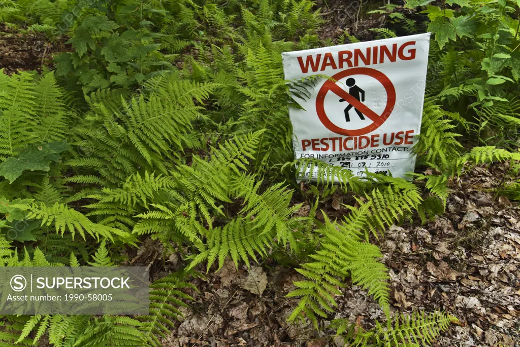 Warning sign to inform of hazardous pesticide use. Spraying conducted in Ontario´s Muskoka region.