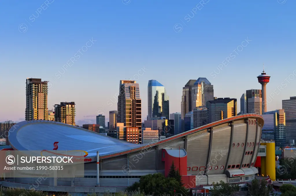 Calgary skyline with Calgary tower and ScotiaBank Saddledome, Calgary, Alberta, Canada