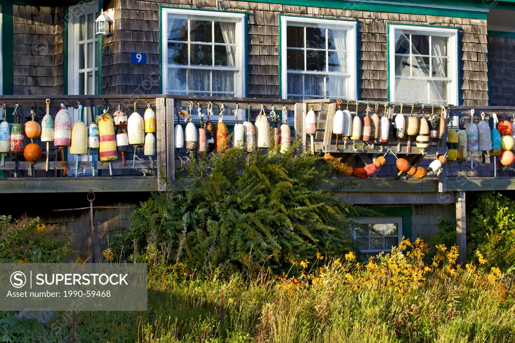 Fishing buoys on deck, North Harbour, Grand Manan Island, Bay of Fundy, New Brunswick, Canada