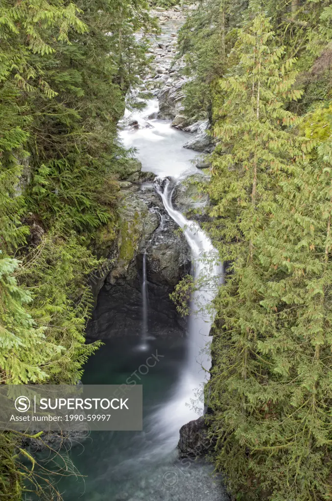 Waterfalls visible from the suspension bridge at Lynn Canyon Park in North Vancouver, British Columbia, Canada.