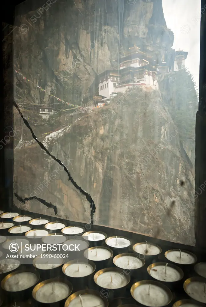 Taktsang Tigers Nest Monastery and butter lamps above Paro, Bhutan