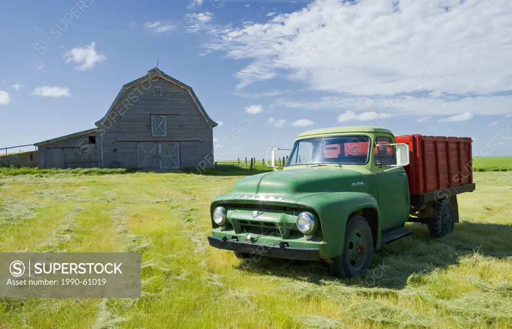 abandoned barn and old farm truck, near Ponteix, Saskatchewan, Canada