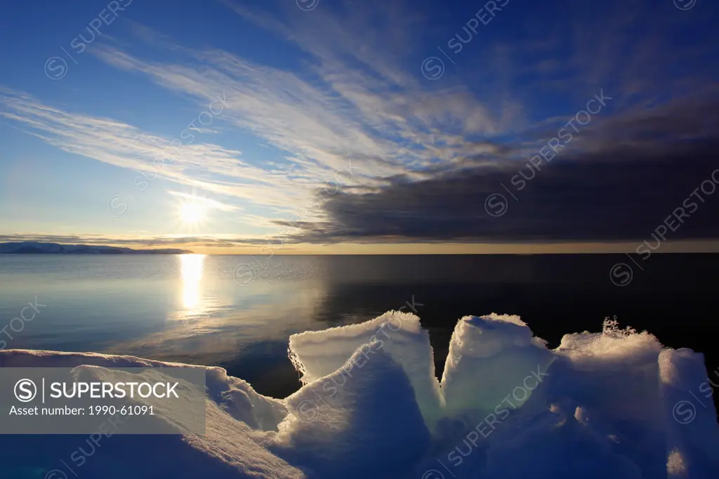 The midnight sun on the Arctic Ocean at the ice floe edge, Nunavut, Canada in the Canadian Arctic