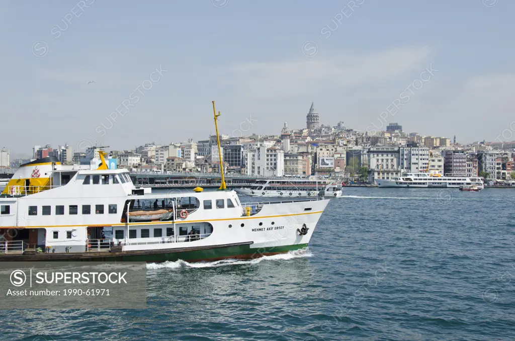 Ferry Bow on the Golden Horn with Beyoglu district and Galata Tower beyond, Istanbul, Turkey