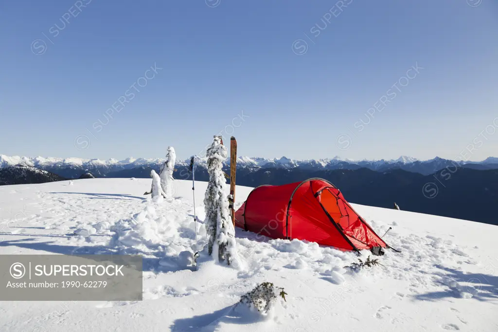 Tent on top of Mount Seymour in the winter with mountains view, British Columbia, Canada.