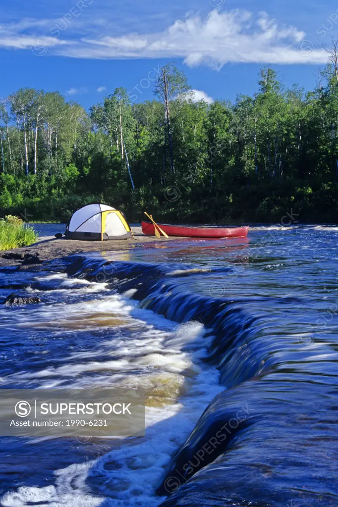Tent and canoe along the Whiteshell River, Whiteshell Provincial Park, Manitoba, Canada