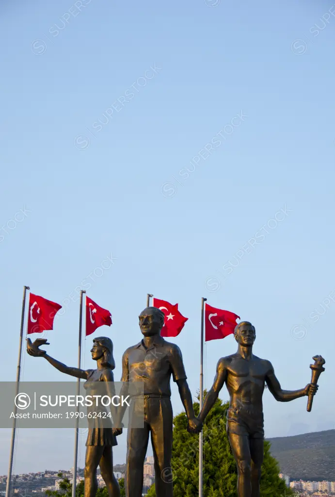 Monument with Mustafa Kemal Atatürk and man and woman, in Kusadasi, a resort town on Turkey´s Aegean coast in Aydin Province