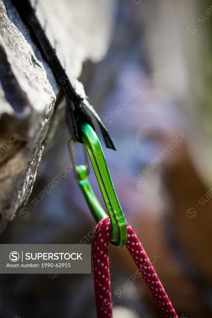 A man sport climbing in the Canadian Rockies. Snake Eyes, 10c, Cougar Creek, Canmore, Alberta, Canada