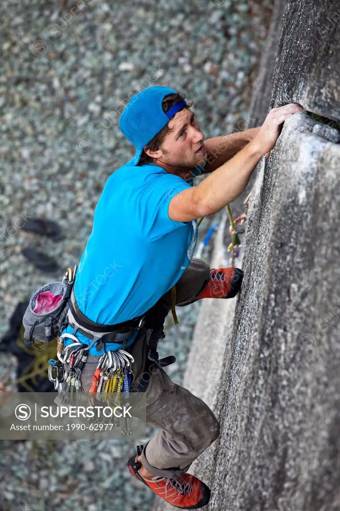 A strong male climber climbing Clean Crack 11b, Squamish, BC