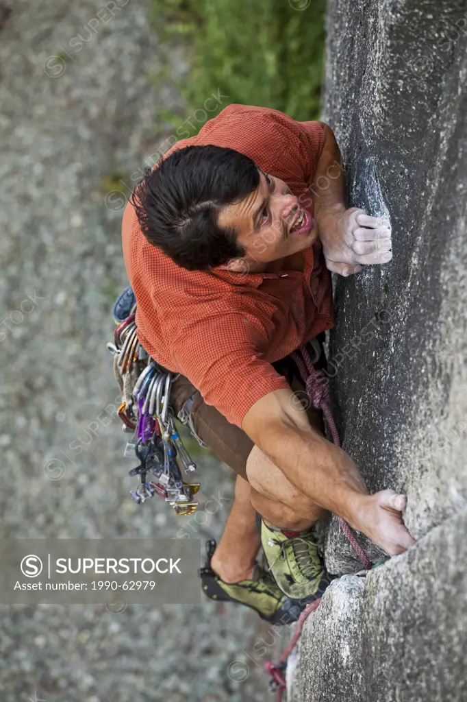 A strong male climber climbing Clean Crack 11b, Squamish, BC