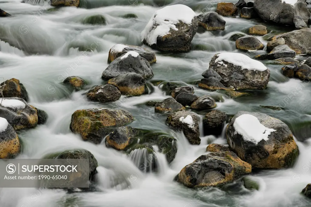 Fresh snow, boulders and rapids in the Gardner River