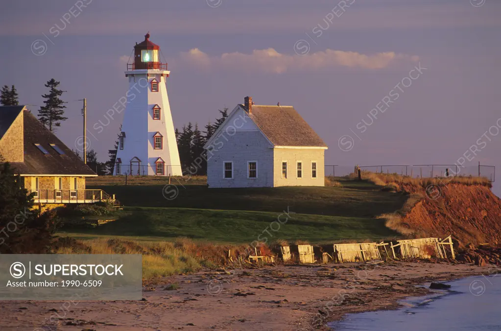 Lighthouse at sunset in Panmure Island Provincial Park, Prince Edward Island, Canada
