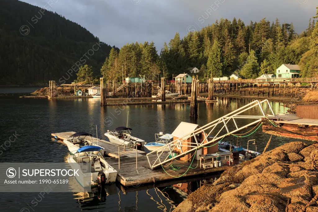 Sunrise illuminates the government dock on the southeast side of Minstrel Island bordering Chatham Channel located on Knight Inlet just east of Turnou...