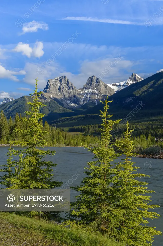 The Three Sisters, mountain peaks. The Bow River, Canmore, Alberta, Canada