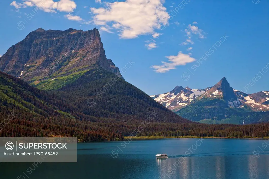 Scenic boat tour on Saint Mary Lake in Glacier National Park, Montana, USA.
