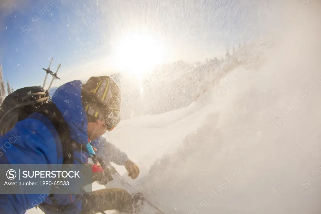 A POV shot of a splitboarder getting a powder faceshot at Sol Mountain, Monashee Backcountry, Revelstoke, BC