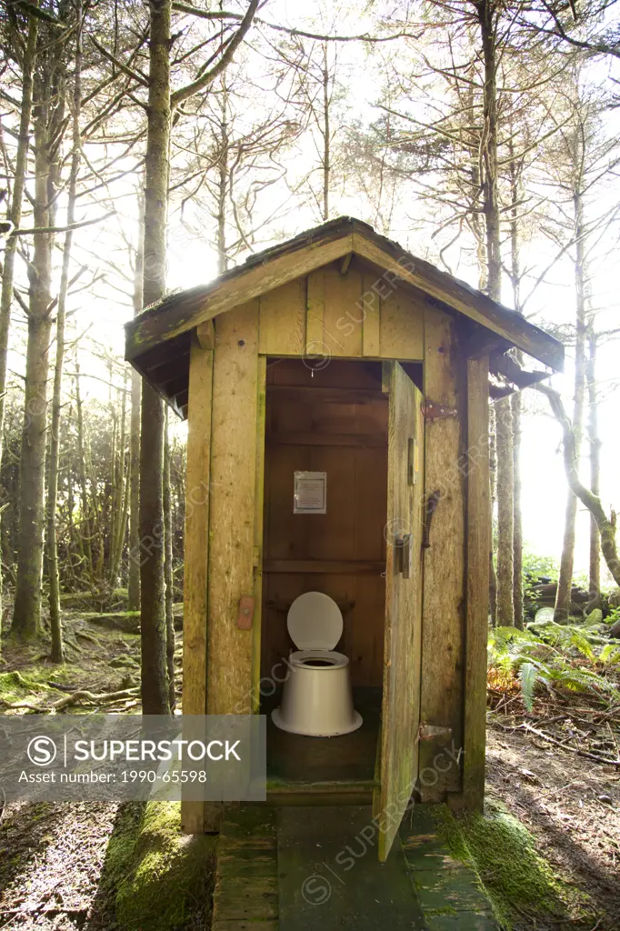 An outhouse or pit toilet in the rainforest at Green Point near Long Beach and Combers Beach in Pacific Rim National Park near Tofino, British Columbi...