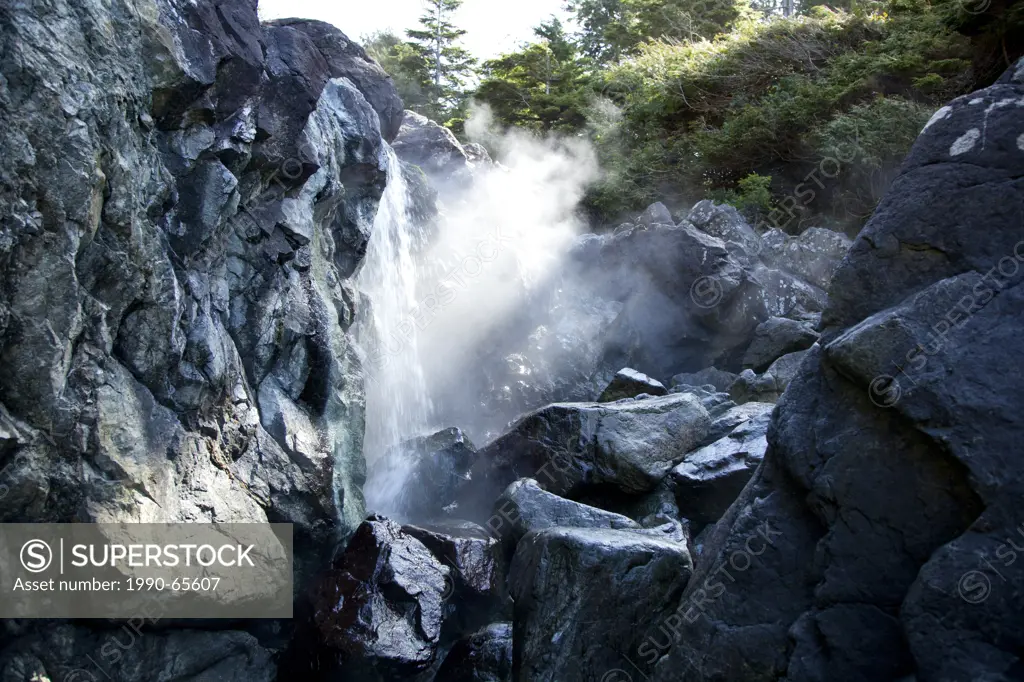 The steaming and natural mineral hot springs at Hot Springs Cove in Maquinna Provincial Park on Vancouver Island near Tofino, British Columbia, BC, Ca...