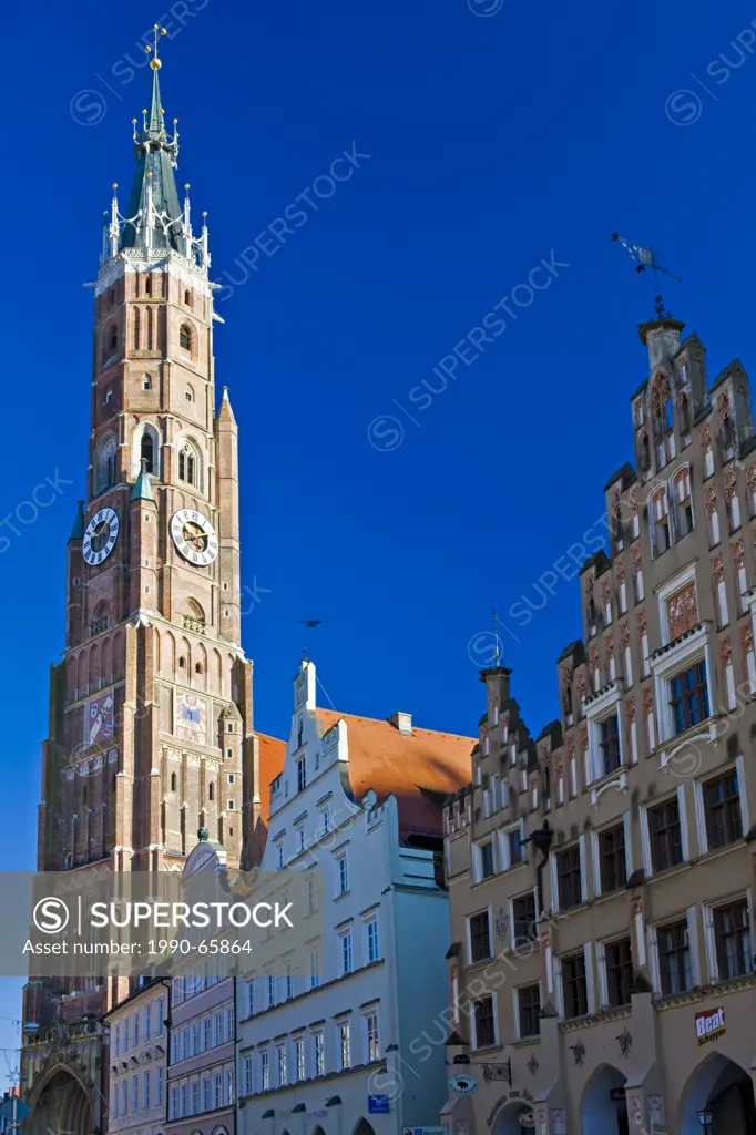 Bell tower of Martinskirche St Martin´s Church and the unique facades of buildings in the Old Town district in the City of Landshut, Bavaria, Germany,...