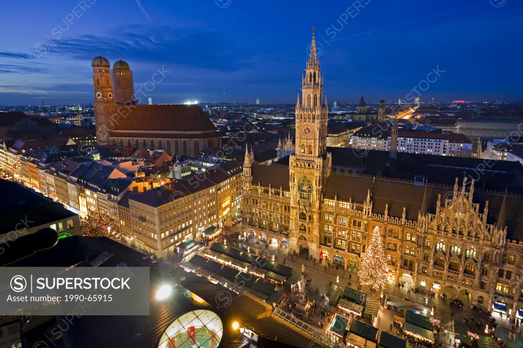 Aerial view of the Christmas Markets in the Marienplatz outside the New Town Hall, with the Frauenkirche, Cathedral of our Blessed Lady in the backgro...