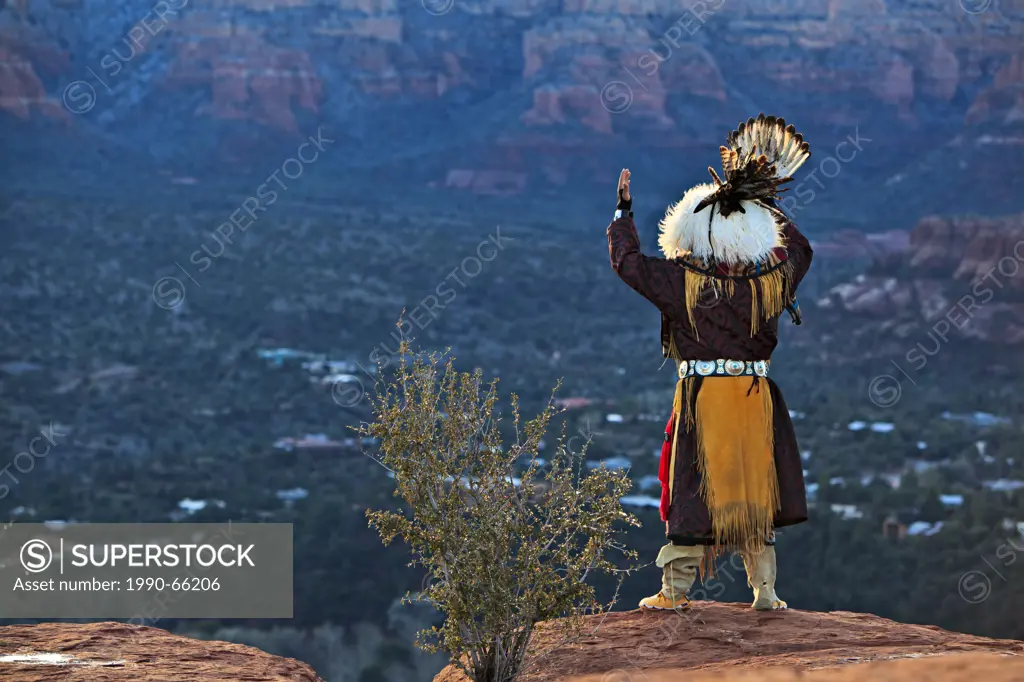 Native american American Indian celebrating the sunrise ceremony on top of a Mesa near Sedona, Arizona, USA