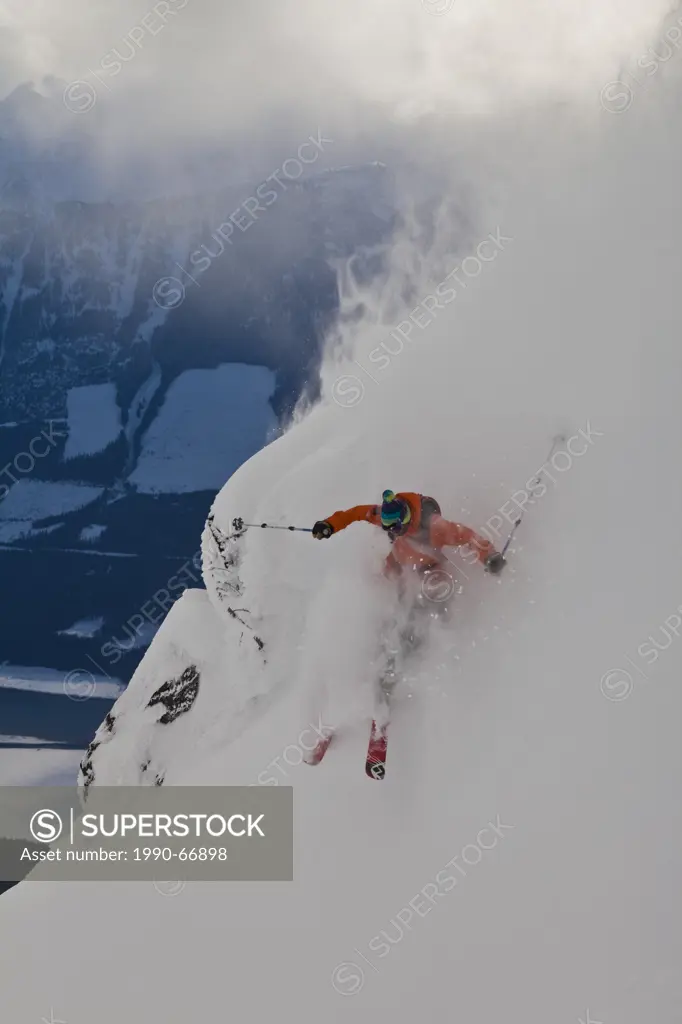 A male free skier in the Revelstoke Mtn Resort Backcountry, BC