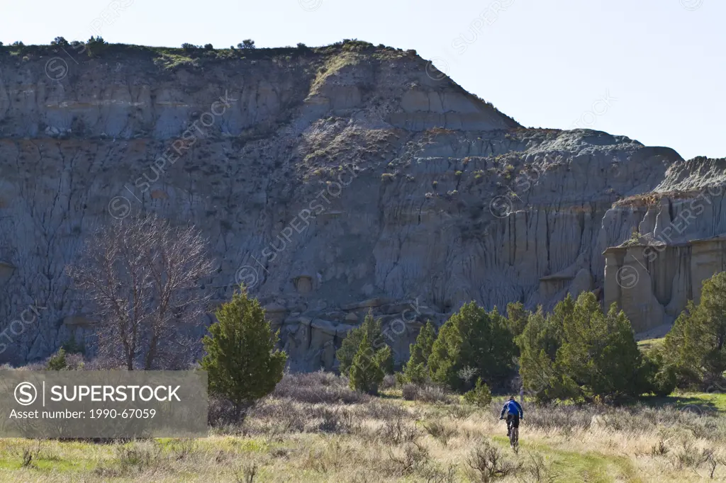 A male mountain biker enjoys the beautiful singletrack of the Maah Daah Hey Trail, North Dakota