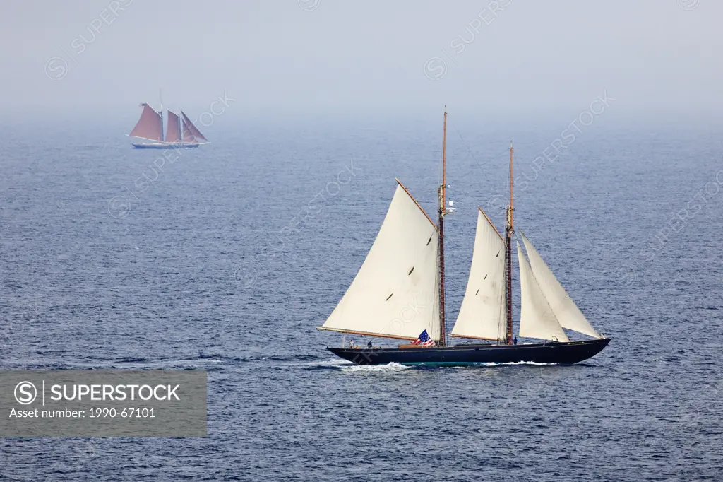 Sailing ships Virginia close and Roseway far sail on open ocean south of Halifax Harbour during the Parade of Sail conclusion of the 2007 Tall Ships f...