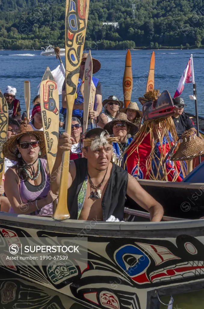 Many People, One Canoe. Salish First Nations, Gathering of Canoes to Protect the Salish Sea, September 1, 2012. Awaiting welcome at Whey_ah_Wichen Cat...