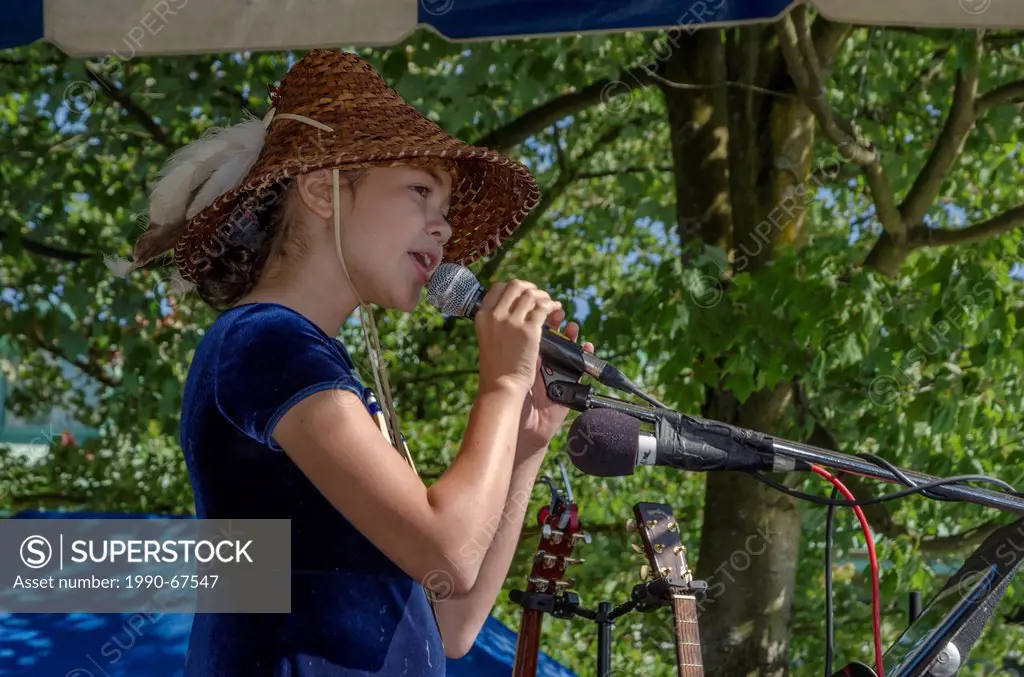 Young singer and acivist, TaKaiya Blaney, 11, from the Sliammon First Nation speaks and sings at the Salish Sea Festival, Sept 2, 2012, Waterfront Pa...