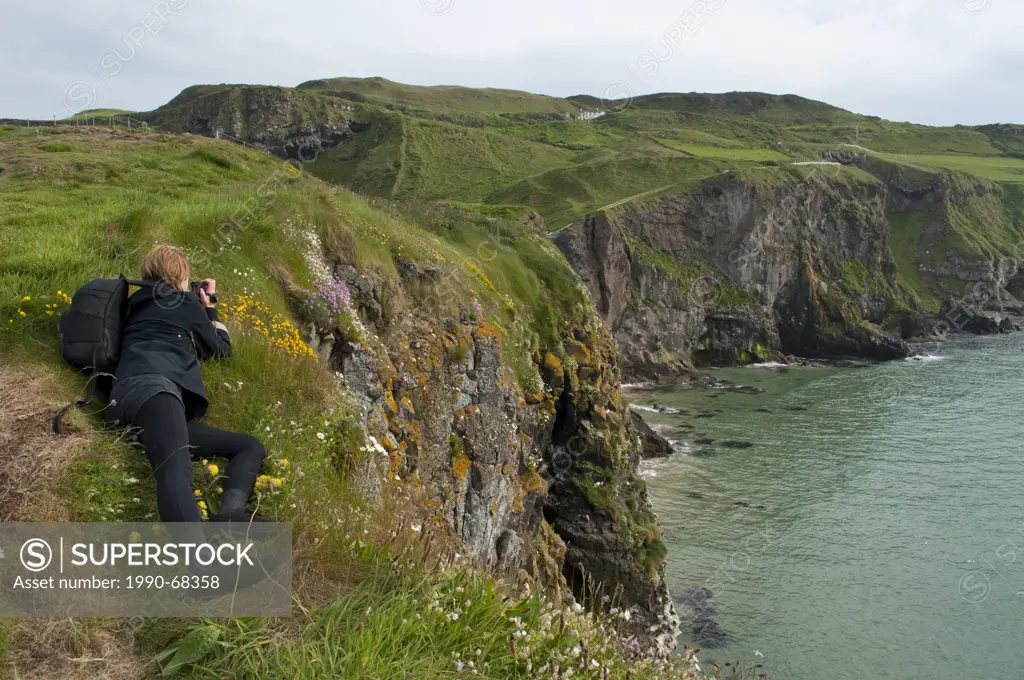 Photographer at Carrickarede Isle, County Antrim, Northern Ireland