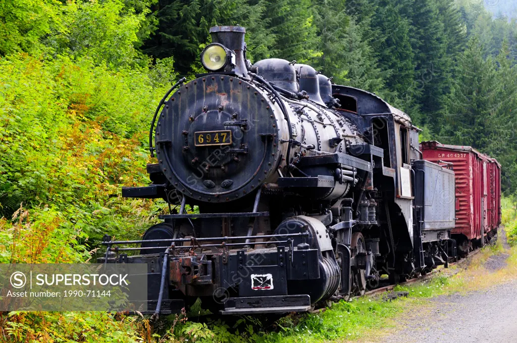 Canadian Pacific Rail´s old steam locomotive 6947 and vintage freight train in the ghost town, Sandon, BC.