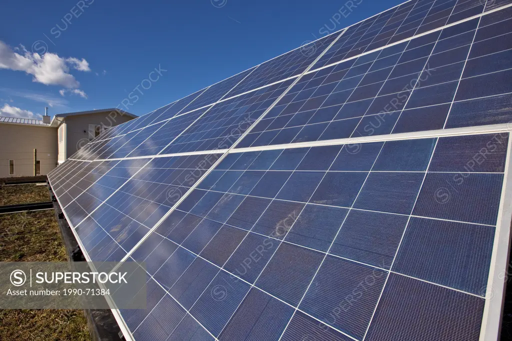Solar panels on farm near Black Diamond, Alberta, Canada.