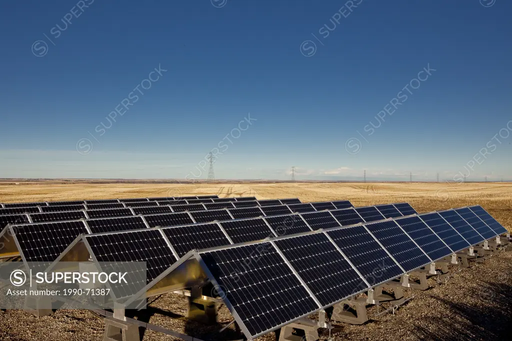 Solar panels on farm near Calgary, Alberta, Canada.