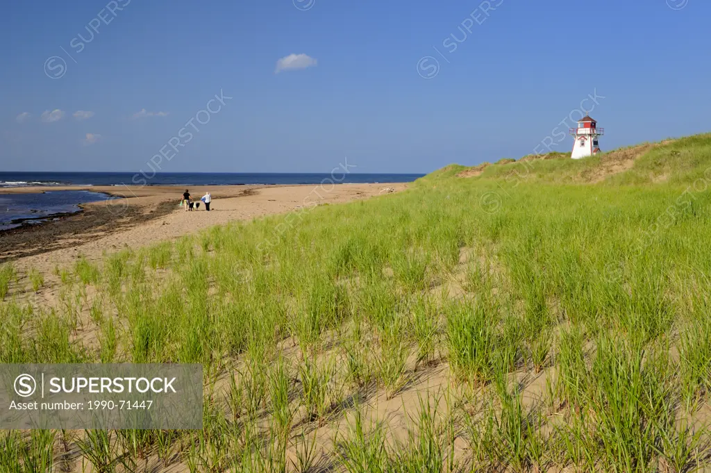 Lighthouse on sand dunes at Cape Stanhope. Covehead Harbour, Prince Edward Island, Canada
