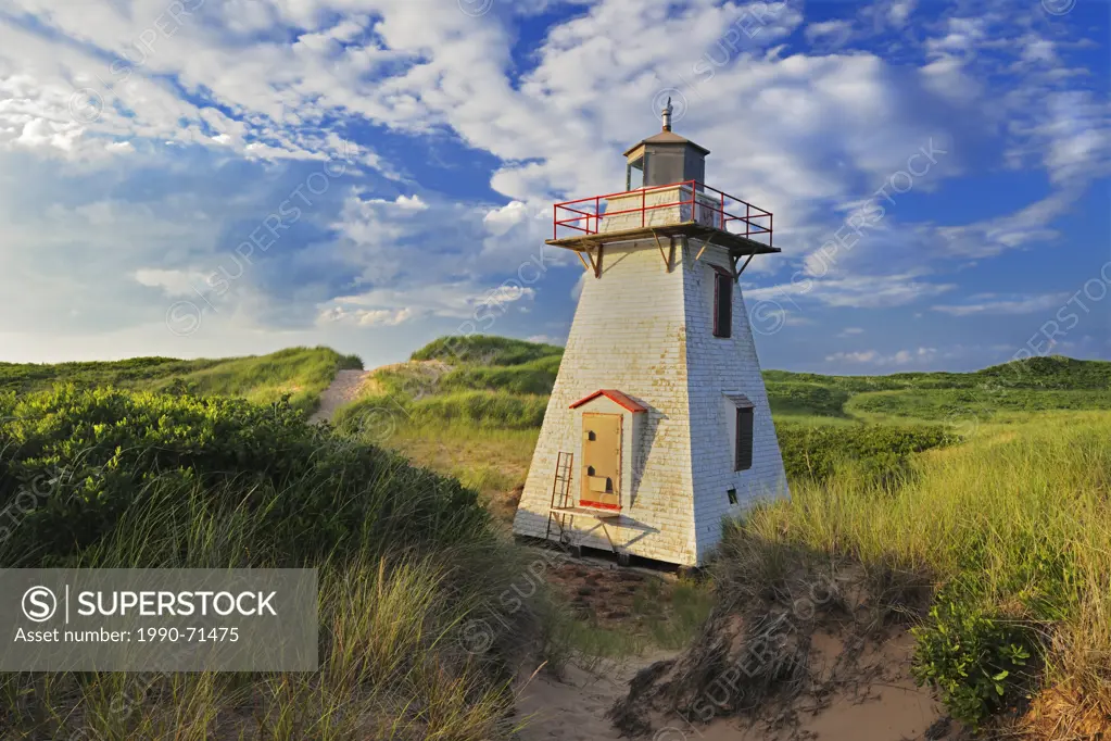 Lighthouse in sand dunes, St Peters Harbour, Prince Edward Island, Canada