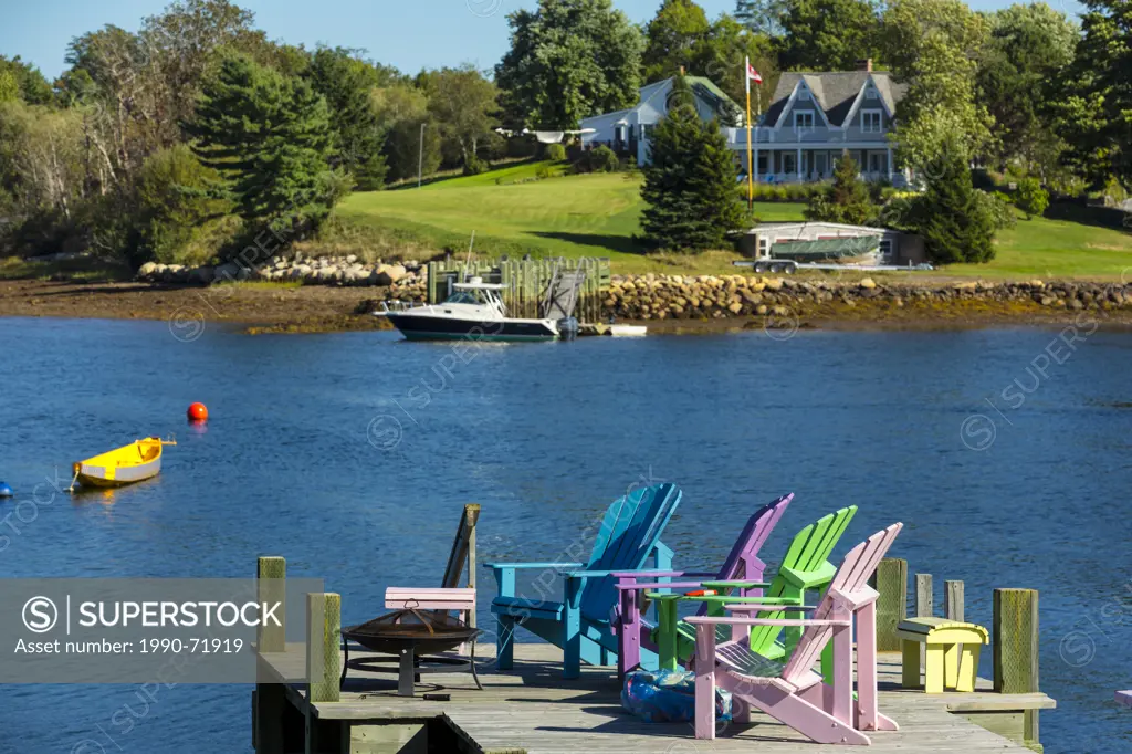 Airondack chairs on wharf, Maders Cove, Nova Scotia, Canada