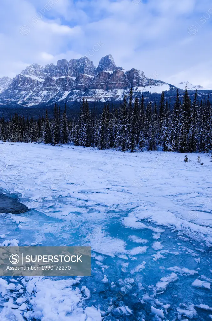 Castle Mountain and frozen Bow River in Winter, Banff National Park, Alberta, Canada