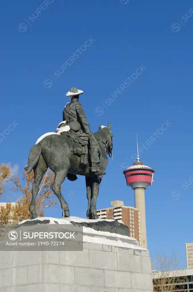 Boer War Memorial equestrian statue in Winter with Calgary Tower in background, Central Memorial Park, (Calgary's oldest park) and the Calgary Tower, ...